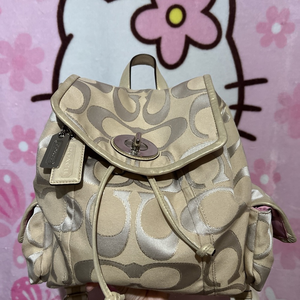 coach mini backpack gold with glitter outline